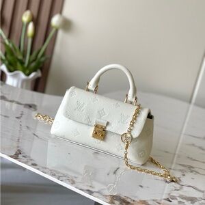 Louis Vuitton White Mini Bag with Gold Accents